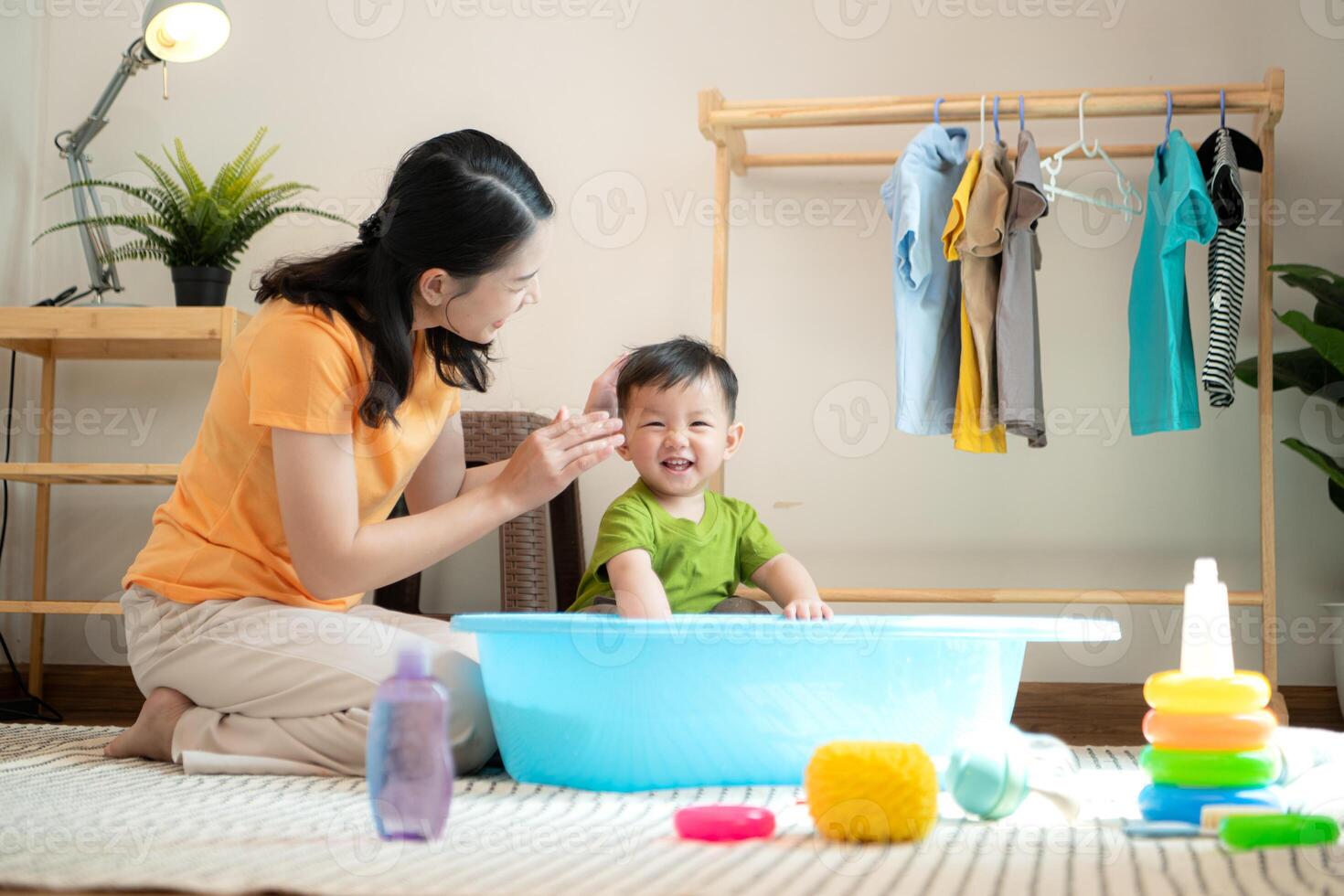 Mom and little child with taking a shower and dressing at home,191 photo