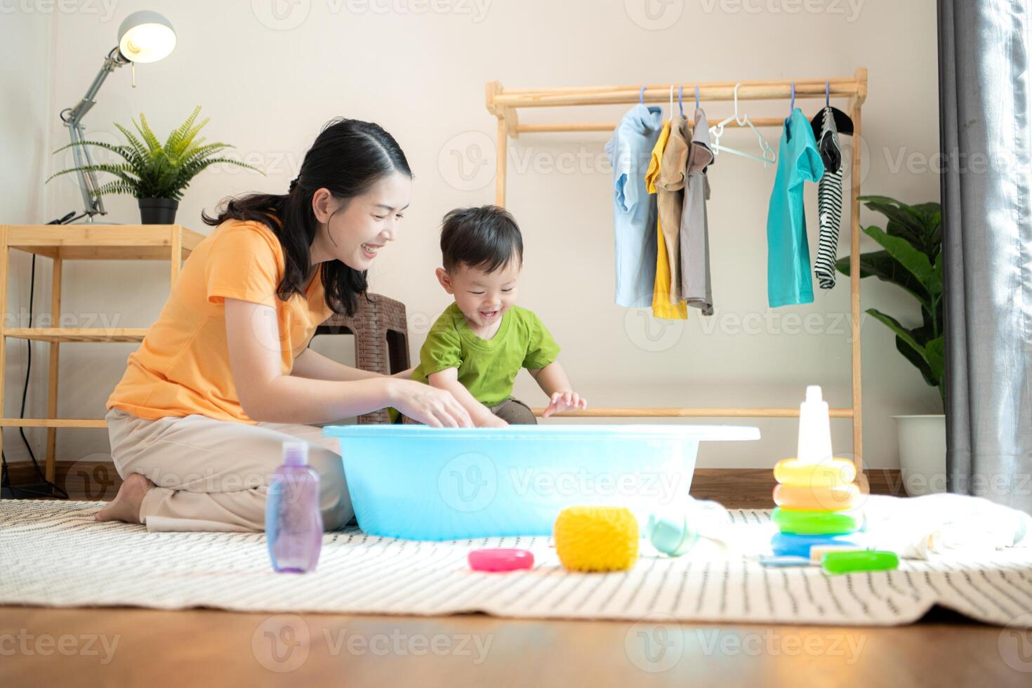 Mom and little child with taking a shower and dressing at home,182 photo