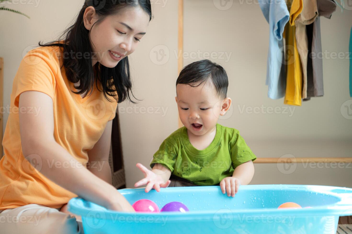 Mom and little child with taking a shower and dressing at home,178 photo