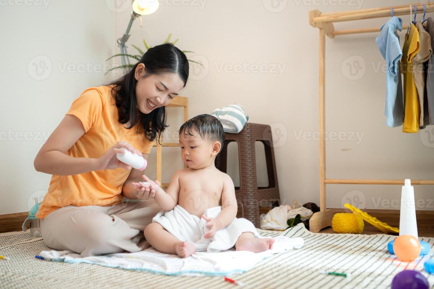 Mom and little child with taking a shower and dressing at home,174 photo