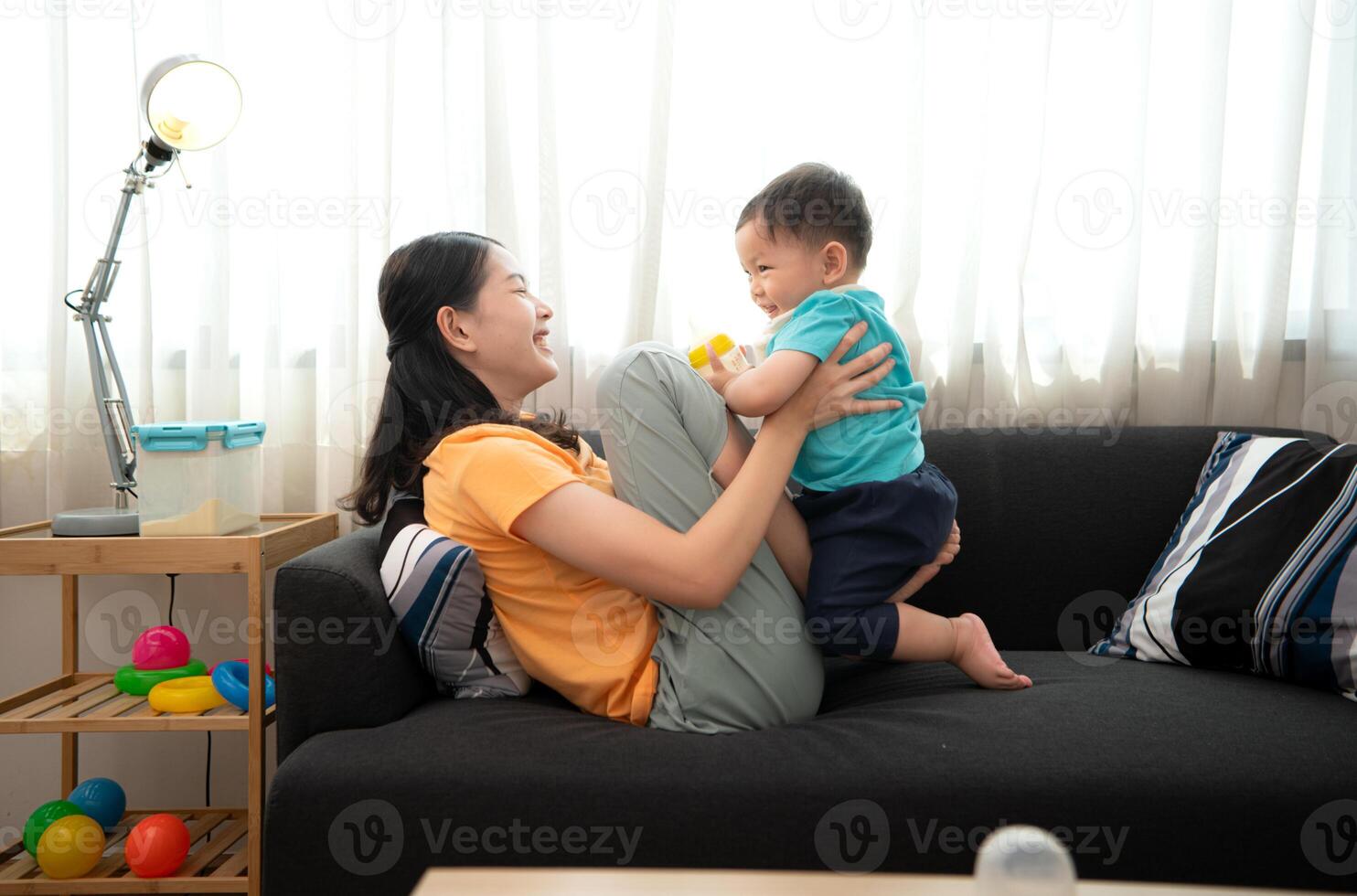 While in vacation at home, a mother engages in activities with little kid,145 photo