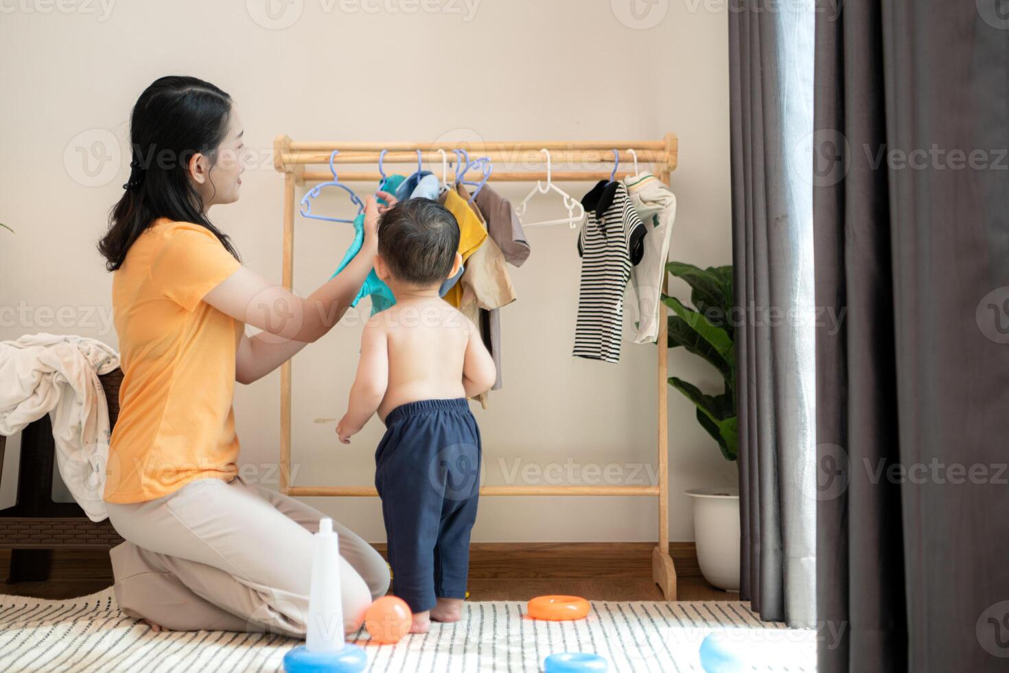 Mom and little child with taking a shower and dressing at home,,131 photo