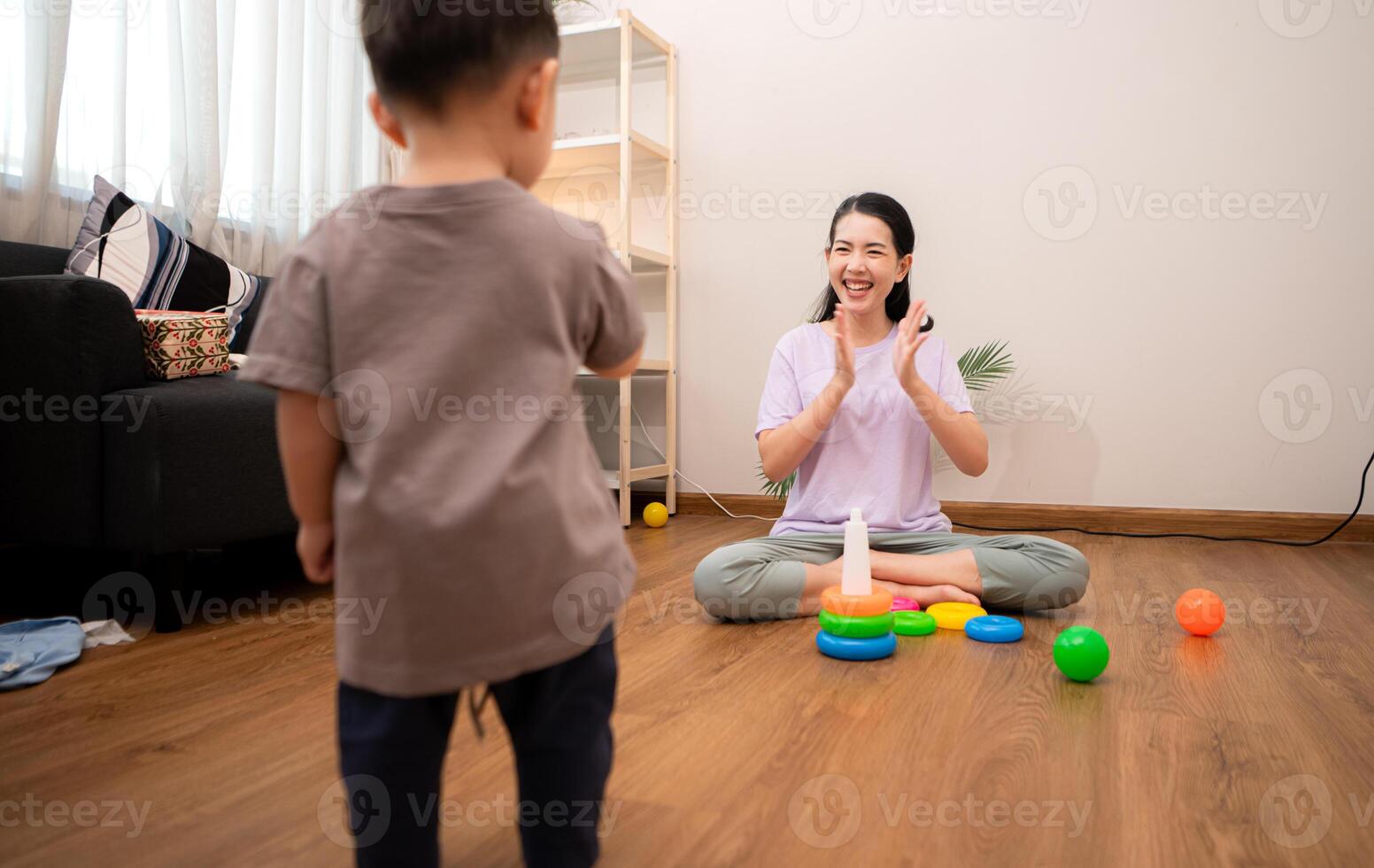 While in vacation at home, a mother engages in activities with little kid,91 photo