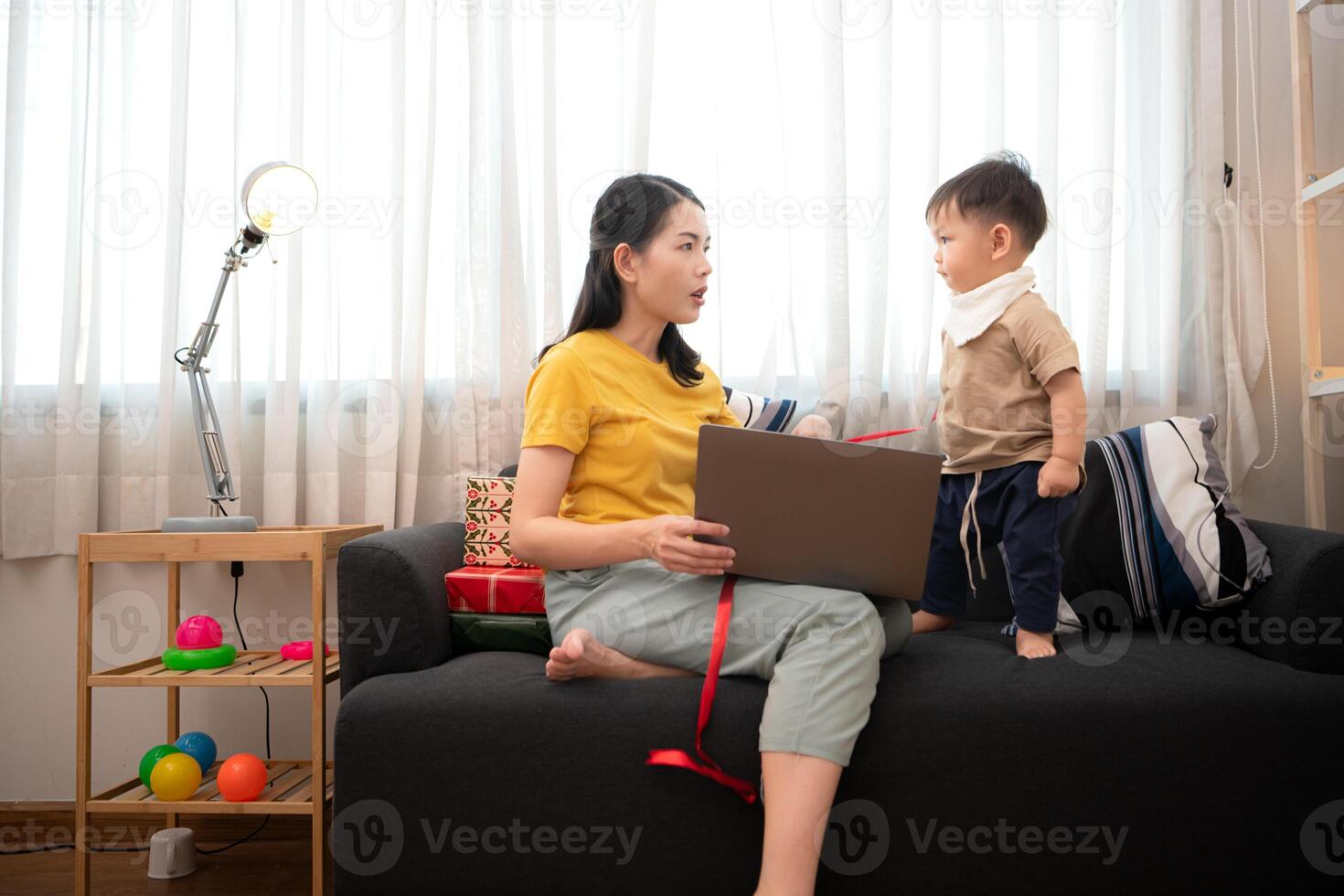 While in vacation at home, a mother engages in activities with little kid,77 photo
