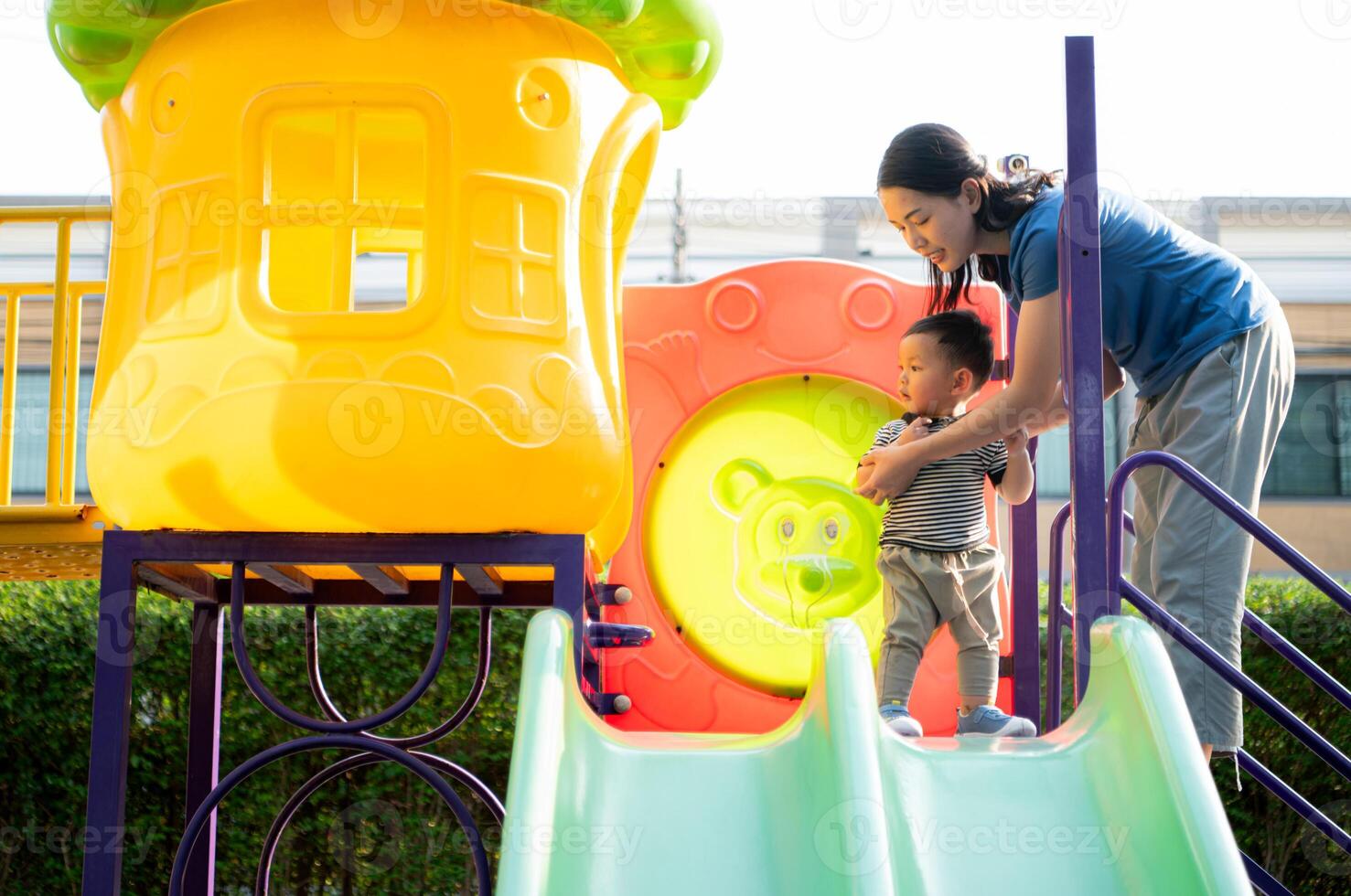 While in vacation at home, a mother engages in activities with little kid in the park,58 photo