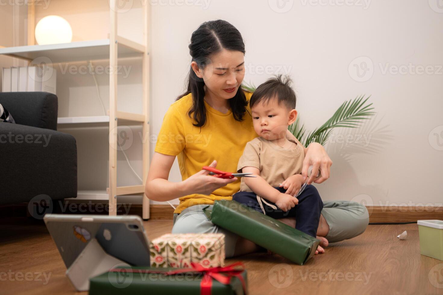 While in vacation at home, a mother gift wrap with little kid,44 photo