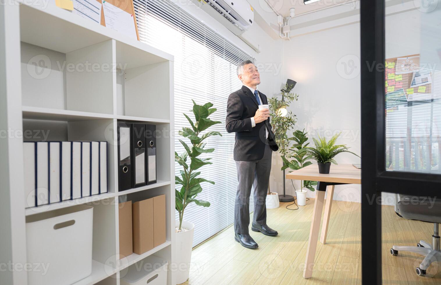 Boss have coffee before meeting to check on progress of business project,243 photo