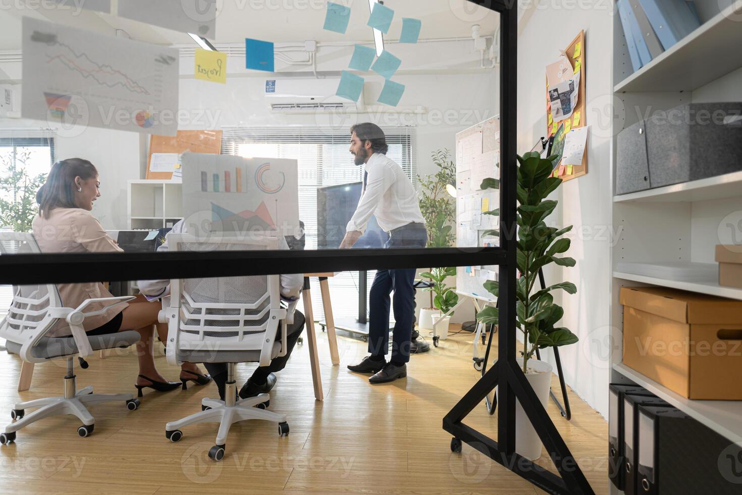In a contemporary office, a group of senior executives with a mission to approve new projects,133 photo
