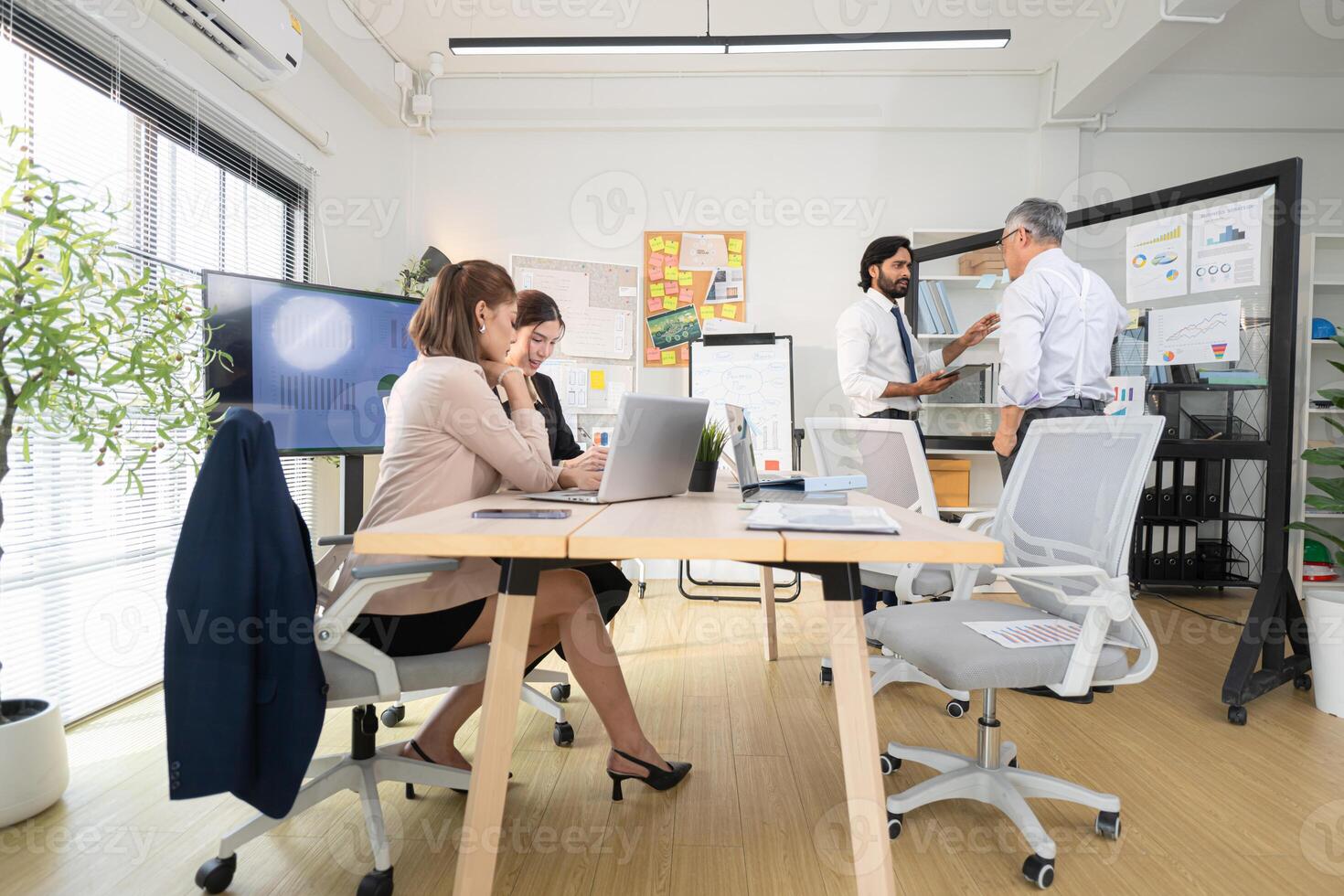 In a contemporary office, a group of senior executives with a mission to approve new projects,111 photo