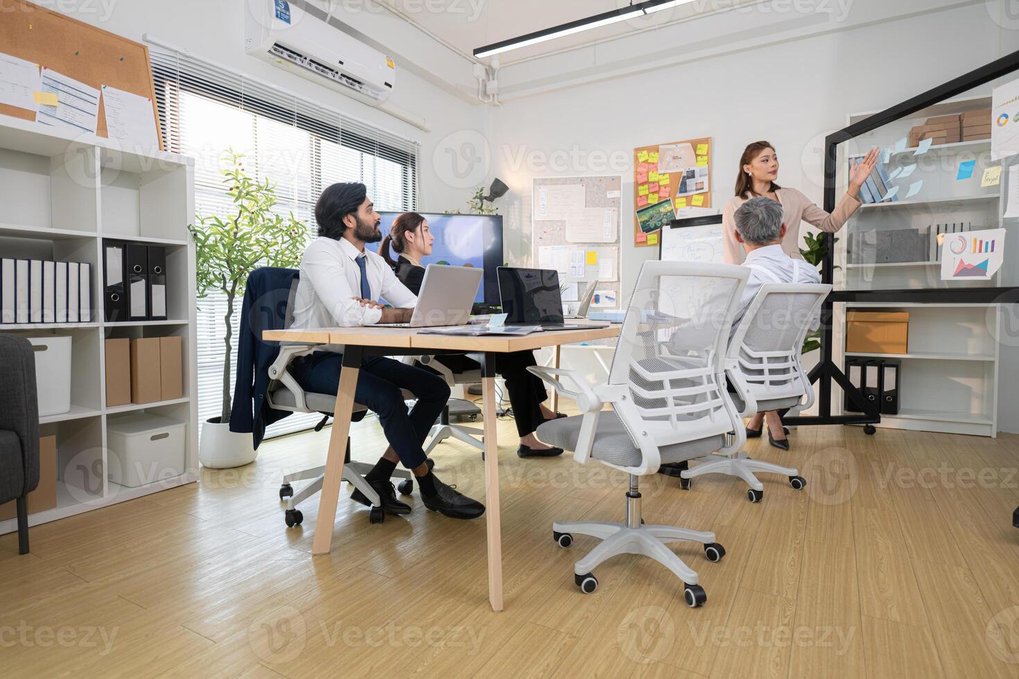 In a contemporary office, a group of senior executives with a mission to approve new projects,106 photo