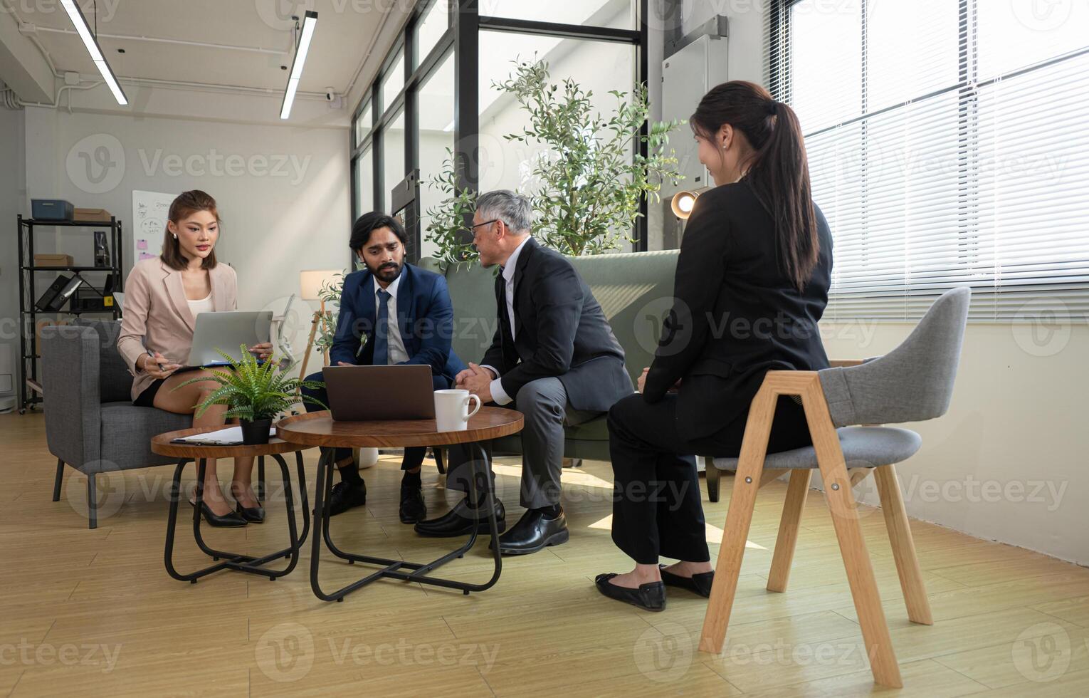 In a contemporary office, a group of senior executives with a mission to approve new projects,84 photo