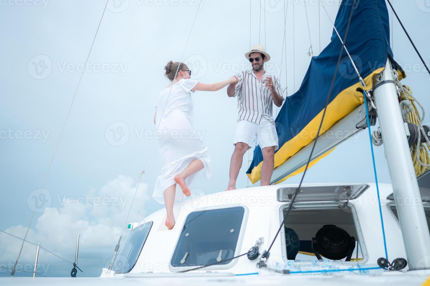 A young couple are enjoying seaside adventure aboard a yacht,78 photo