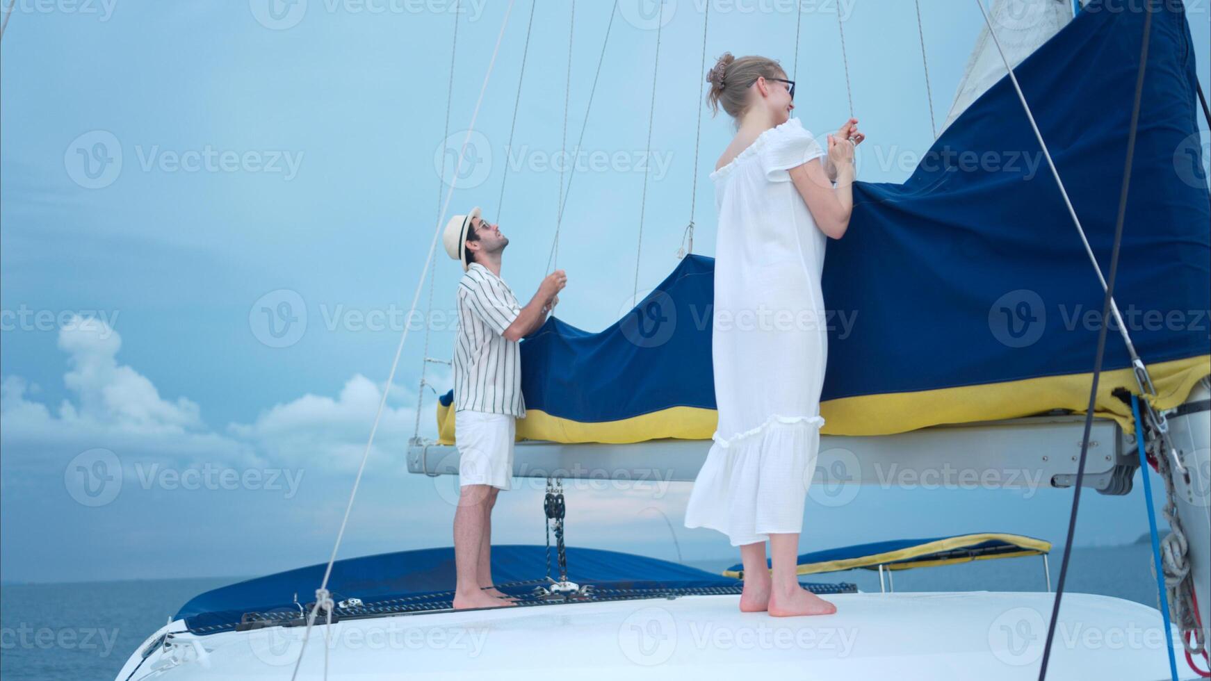 A young couple are enjoying seaside adventure aboard a yacht,47 photo