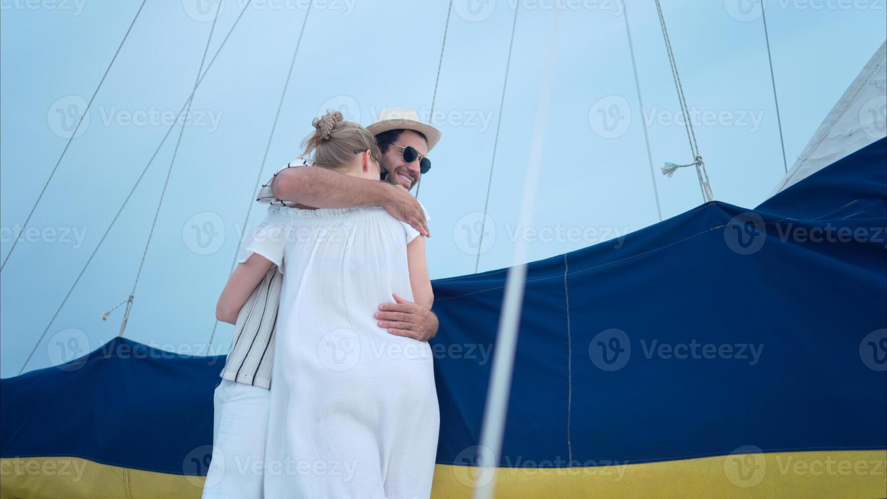 A young couple are enjoying seaside adventure aboard a yacht,15 photo
