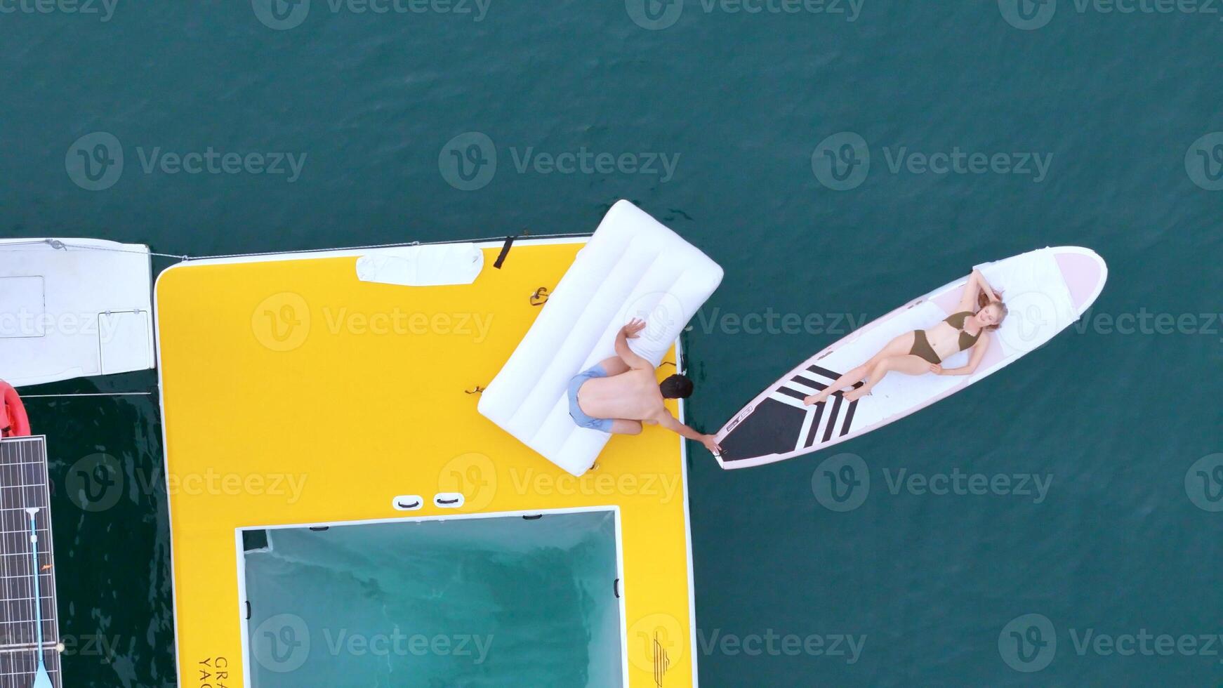 A young couple are enjoying seaside adventure aboard a yacht,9 photo