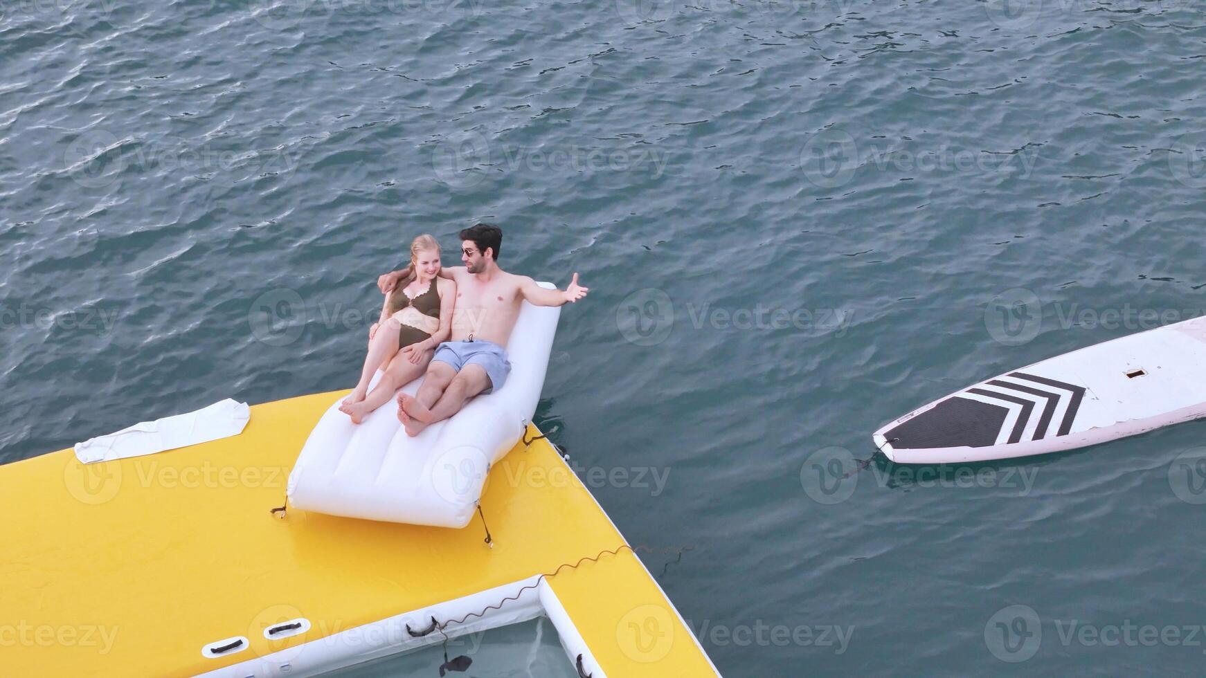 A young couple are enjoying seaside adventure aboard a yacht,8 photo