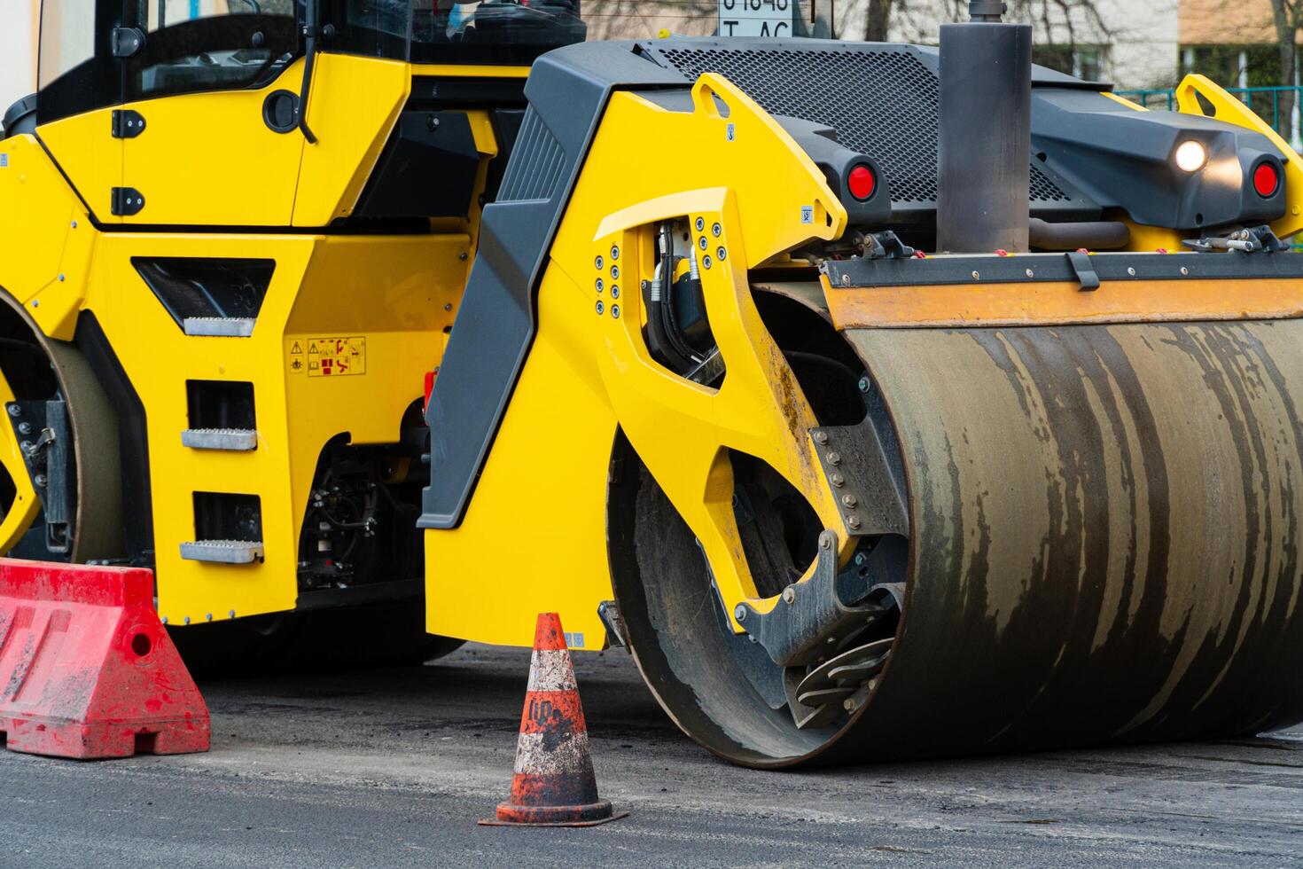 Close up on the road roller working on the new road construction site. Road construction photo