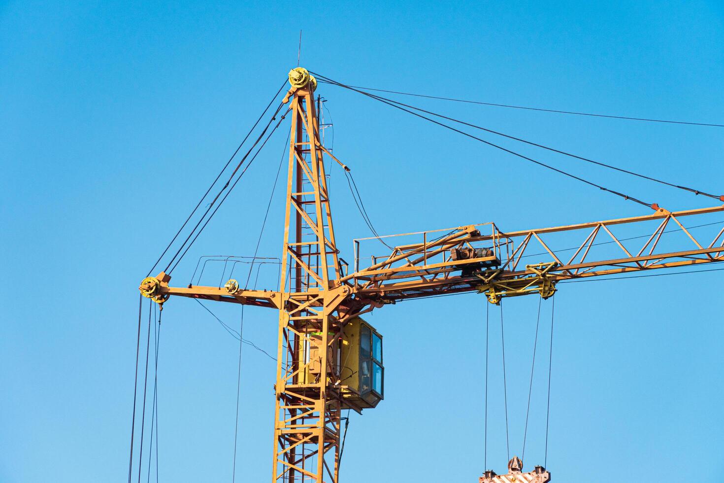 Yellow crane. Technological equipment for construction photo