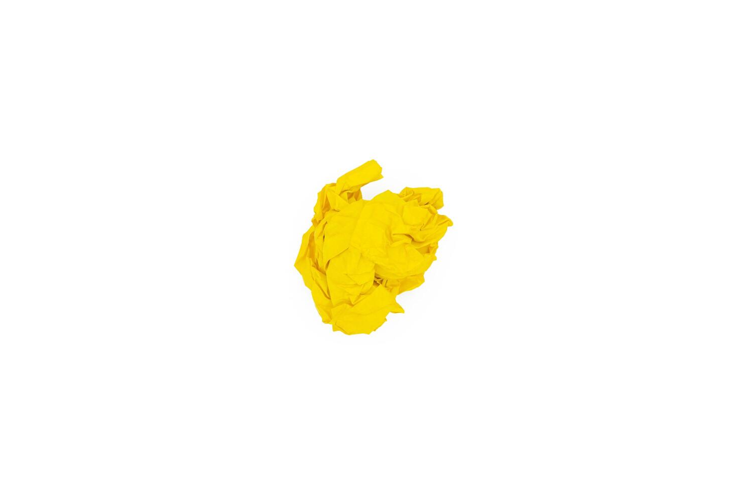 One yellow crumpled paper ball isolated on white. Blank for the designer. Ideas concepts with paper crumpled ball photo