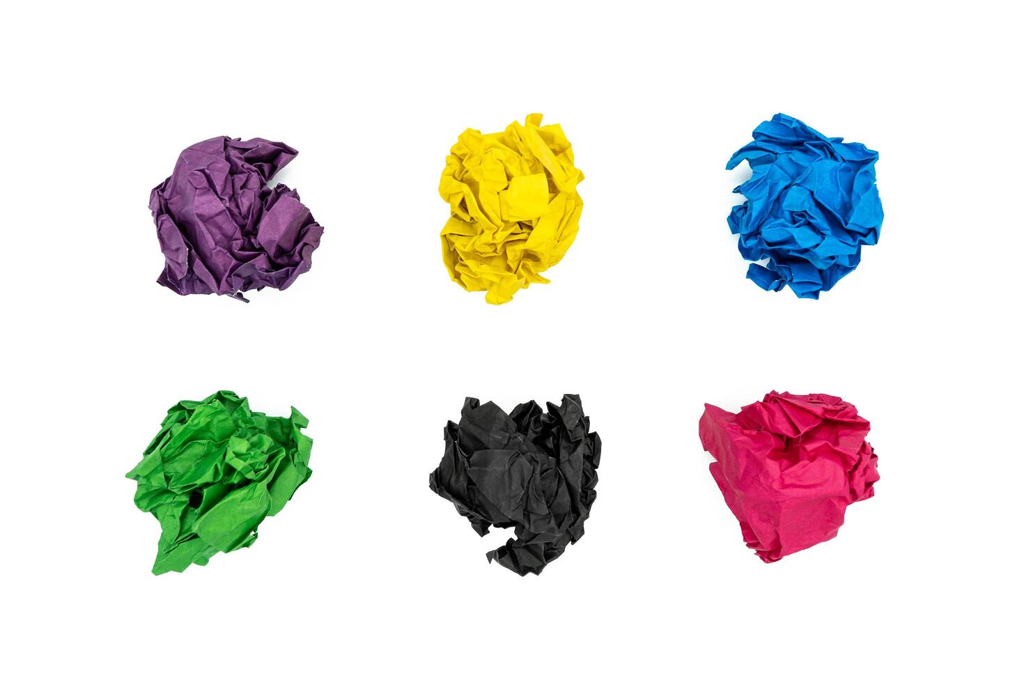 Set of crumpled paper balls isolated on white background photo