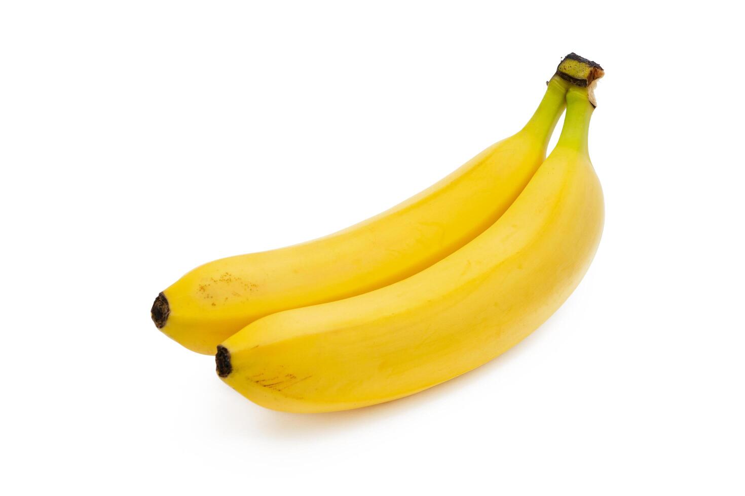 Two ripe bananas isolated on white background. Tasty bananas. Exotic. Tropical photo