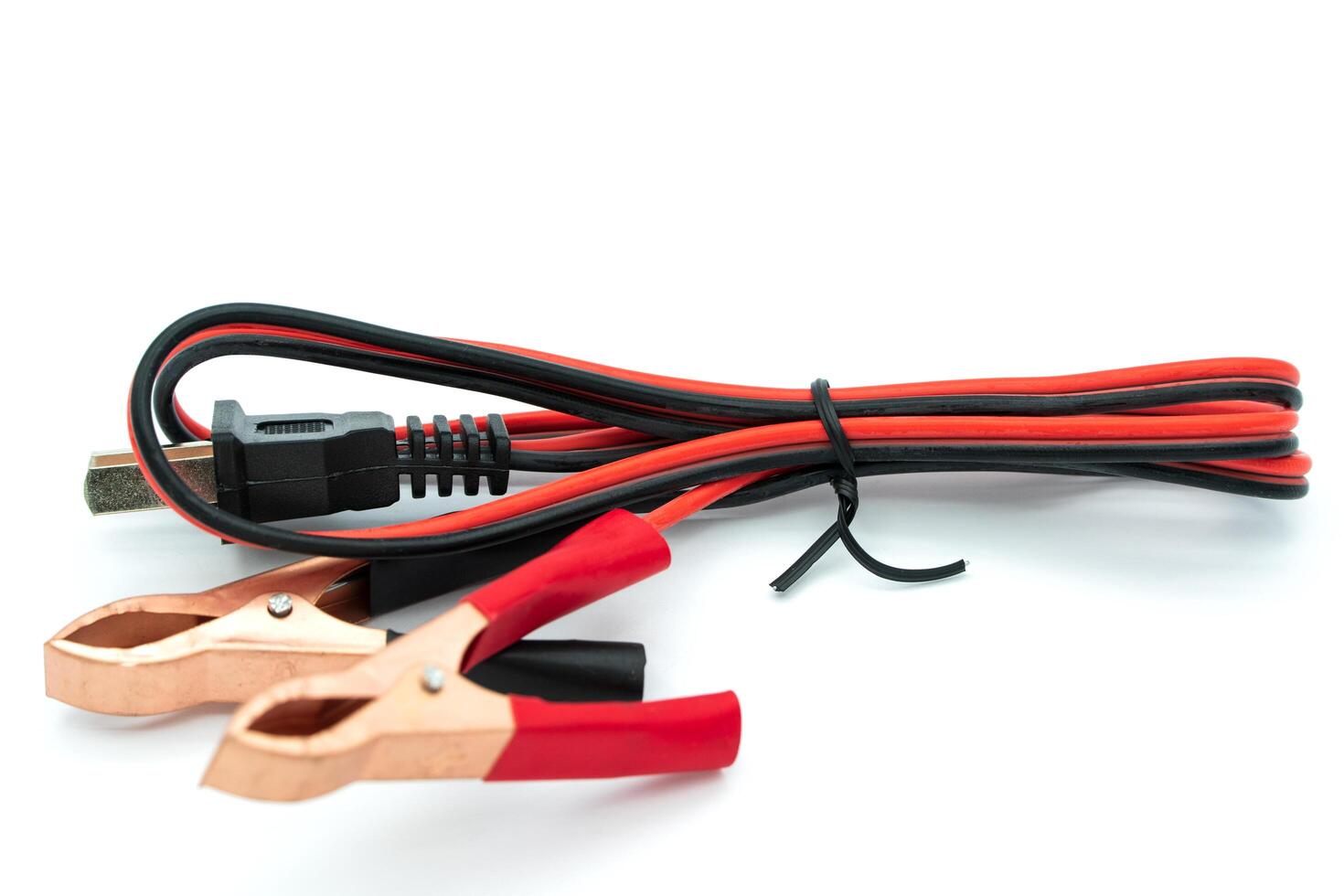 Cable with Crocodile clip. Metal crocodile clip. Black and red wires with copper clamps isolated on a white background photo