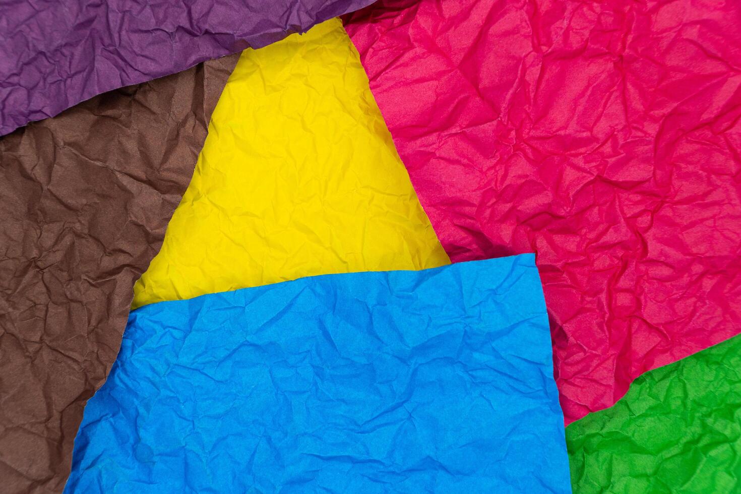 Colors crumpled paper texture background. Texture of crumpled paper. Crumpled paper photo