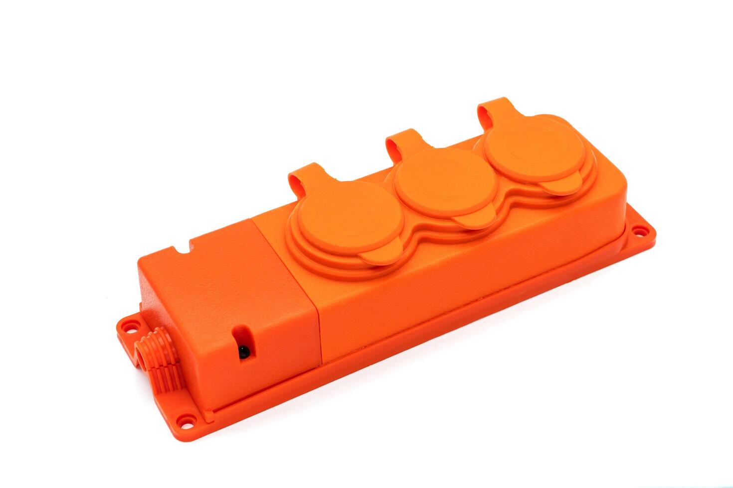 Close up of orange extension power strip isolated on white photo