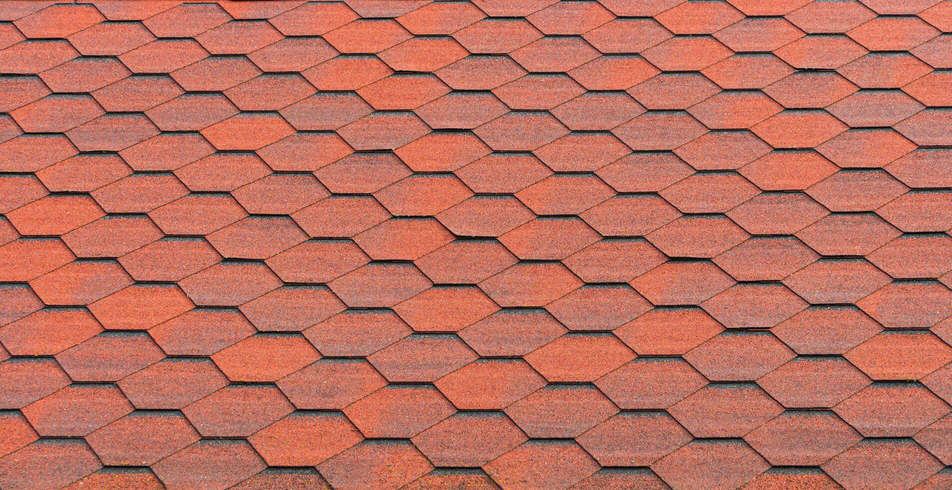 The texture of bitumen shingles photo