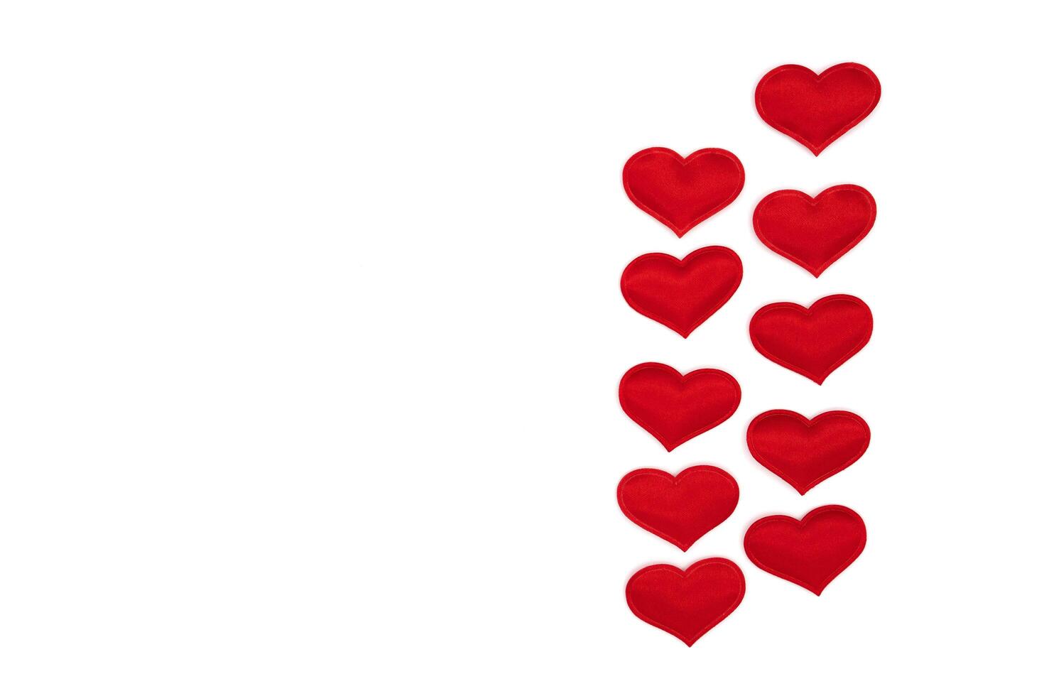 Red hearts isolated on white, template for a card photo