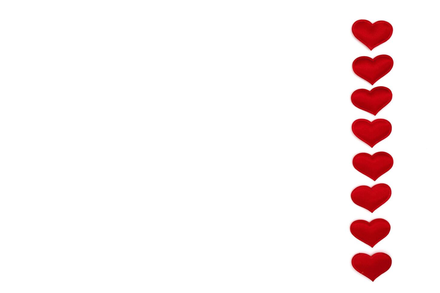 Red hearts isolated on white photo