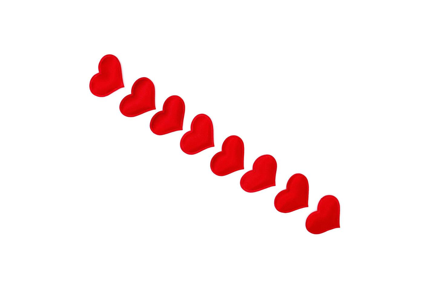 Little red hearts isolated on white, blank for the designer photo