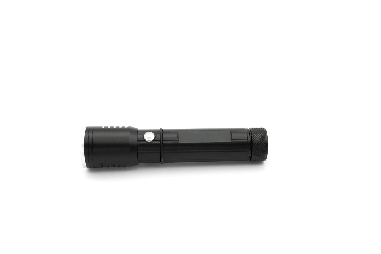 Modern black metal flashlight isolated on white photo
