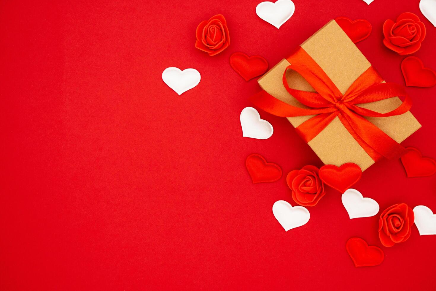 Gift box in craft packaging. Template for posters and banners with copy space. Box with a gift for Birthday, Wedding, Valentine's Day, March 8. photo