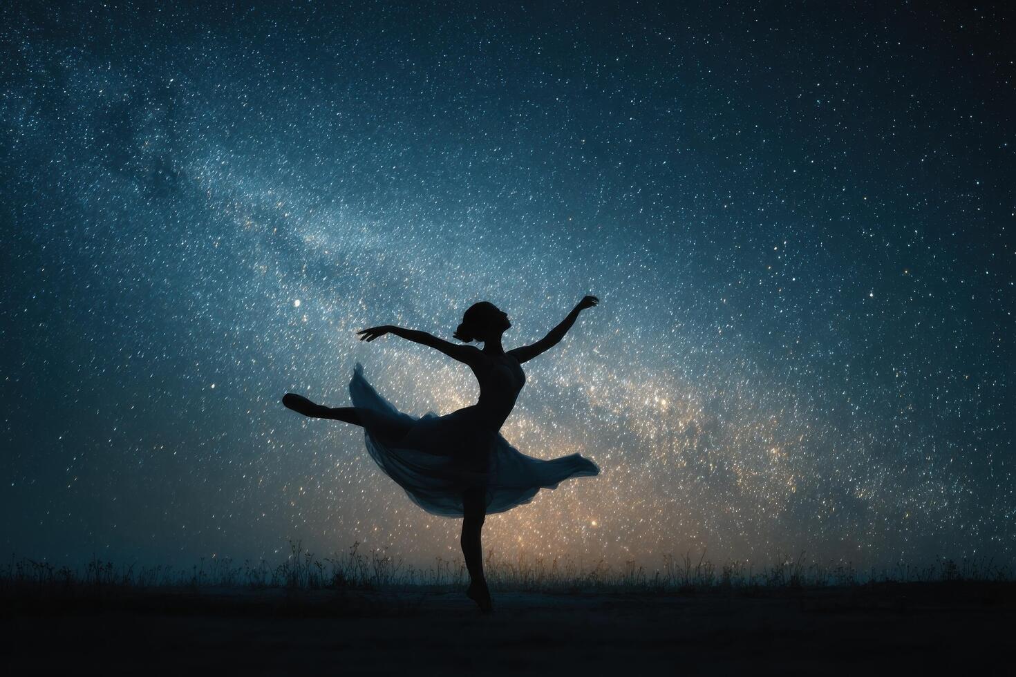 A woman in a dress is dancing in the night sky photo