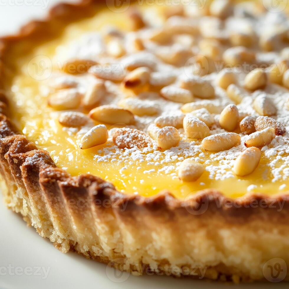A close-up of a sweet and delicate torta della nonna dessert, a traditional Italian dessert, consisting of a shortcrust pastry shell filled with a creamy custard, infused with lemon zest, and topped with a sprinkle of pine nuts and powdered sugar, baked u photo