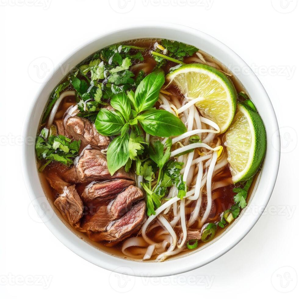 A steaming bowl of pho, the traditional Vietnamese noodle soup, featuring thinly sliced beef, fresh herbs, bean sprouts, and a fragrant beef broth. Lime wedges and hoisin sauce complete the dish. Isolated on clean white background photo
