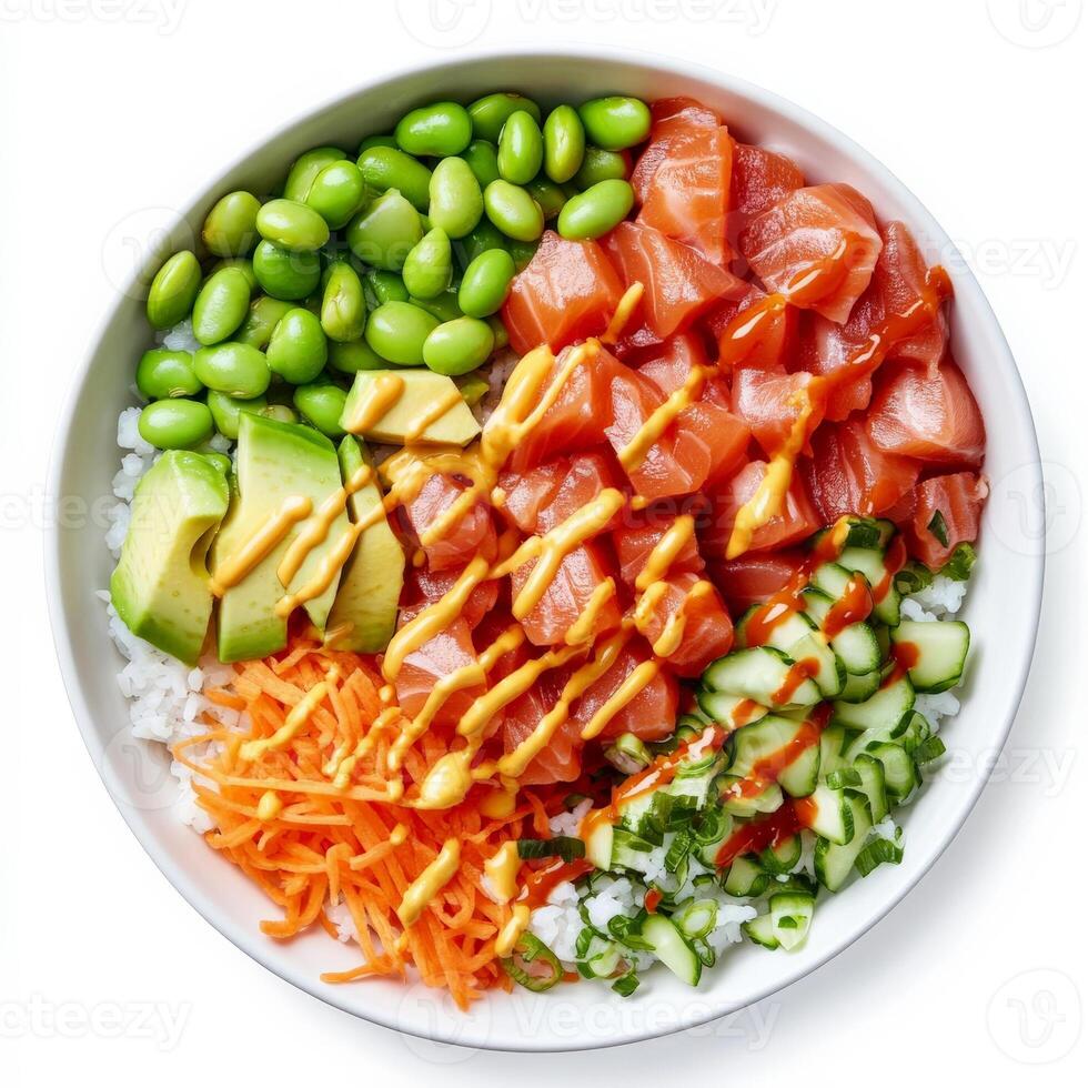 A colorful poke bowl with diced raw salmon, avocado, edamame, shredded carrots, and sushi rice, drizzled with a creamy sriracha mayo sauce. The ingredients are neatly arranged for a vibrant presentation. Isolated on clean white background photo