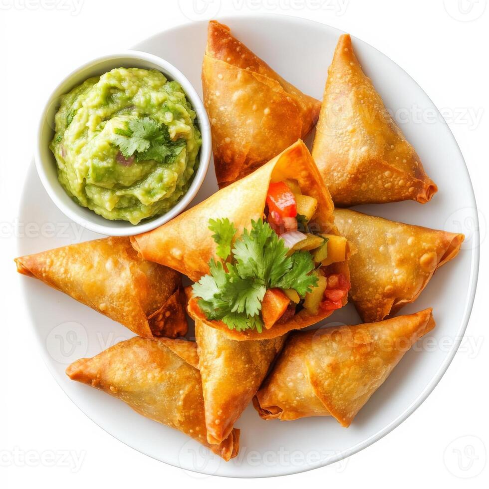 A plate of Indian samosas, transformed with the bold and savory flavors of Mexican cuisine, featuring crispy fried pastries filled with spiced potatoes, onions, and cilantro, served with a side of guacamole and salsa, a unique and flavorful take on an Ind photo