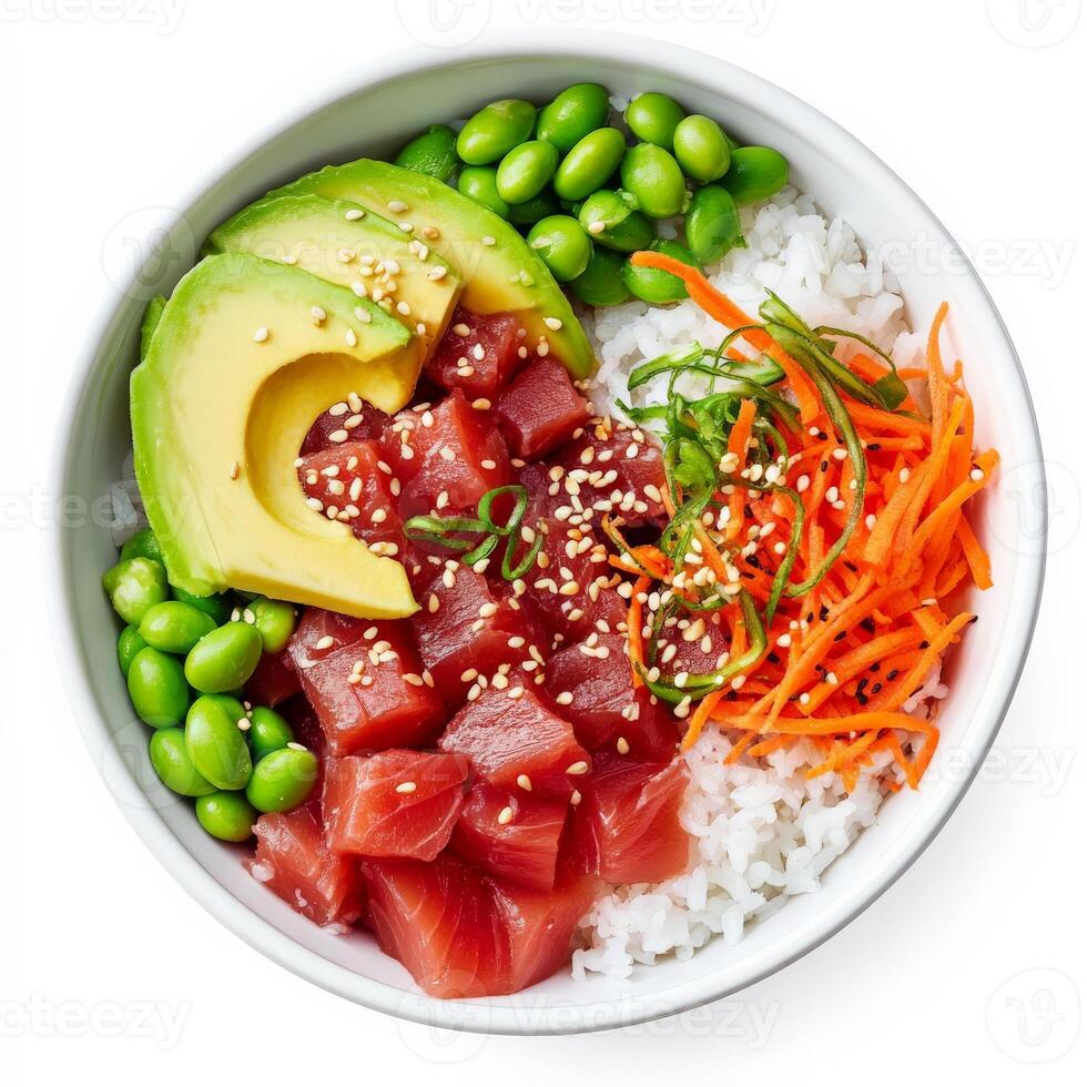 A fresh poke bowl filled with diced raw tuna, sushi rice, edamame, avocado slices, and shredded carrots. The ingredients are drizzled with a sesame-soy sauce and sprinkled with sesame seeds for extra flavor. Isolated on clean white background photo