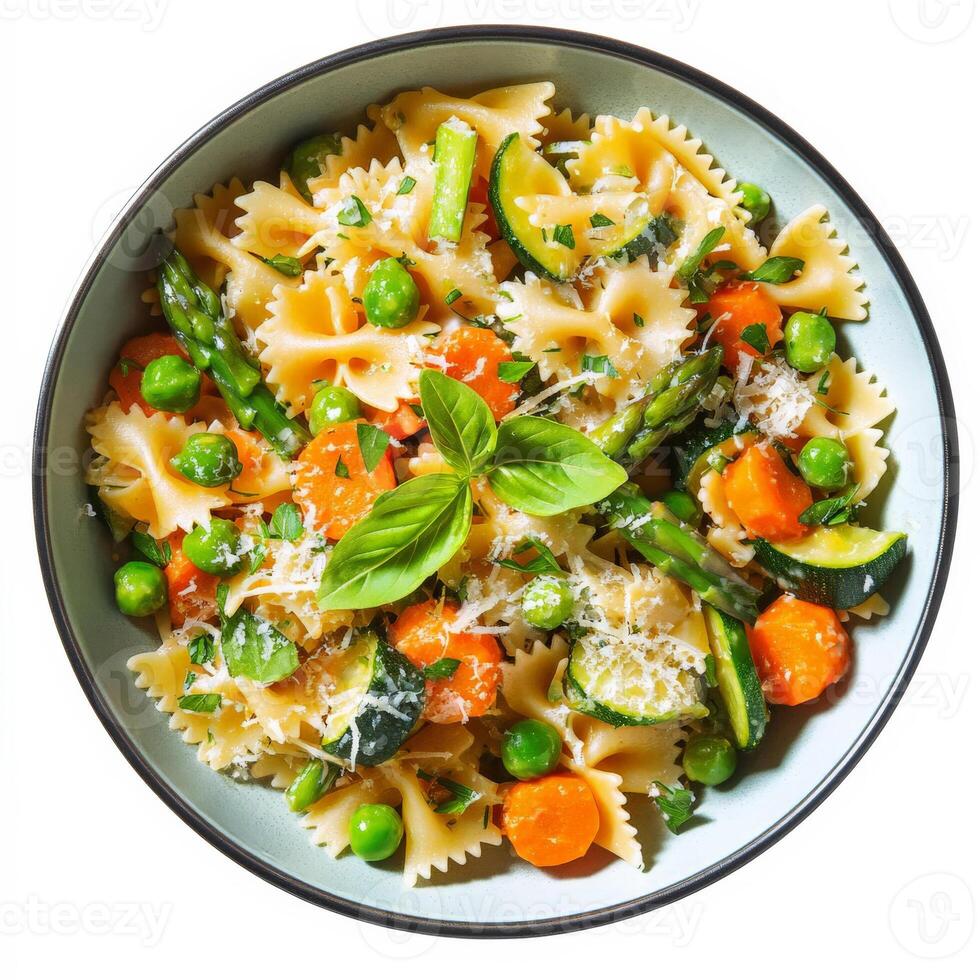 A vibrant bowl of pasta primavera, featuring pasta tossed with fresh spring vegetables, such as asparagus, peas, zucchini, and carrots, in a light cream or garlic sauce, garnished with fresh herbs and grated parmesan cheese, isolated on clean white backgr photo