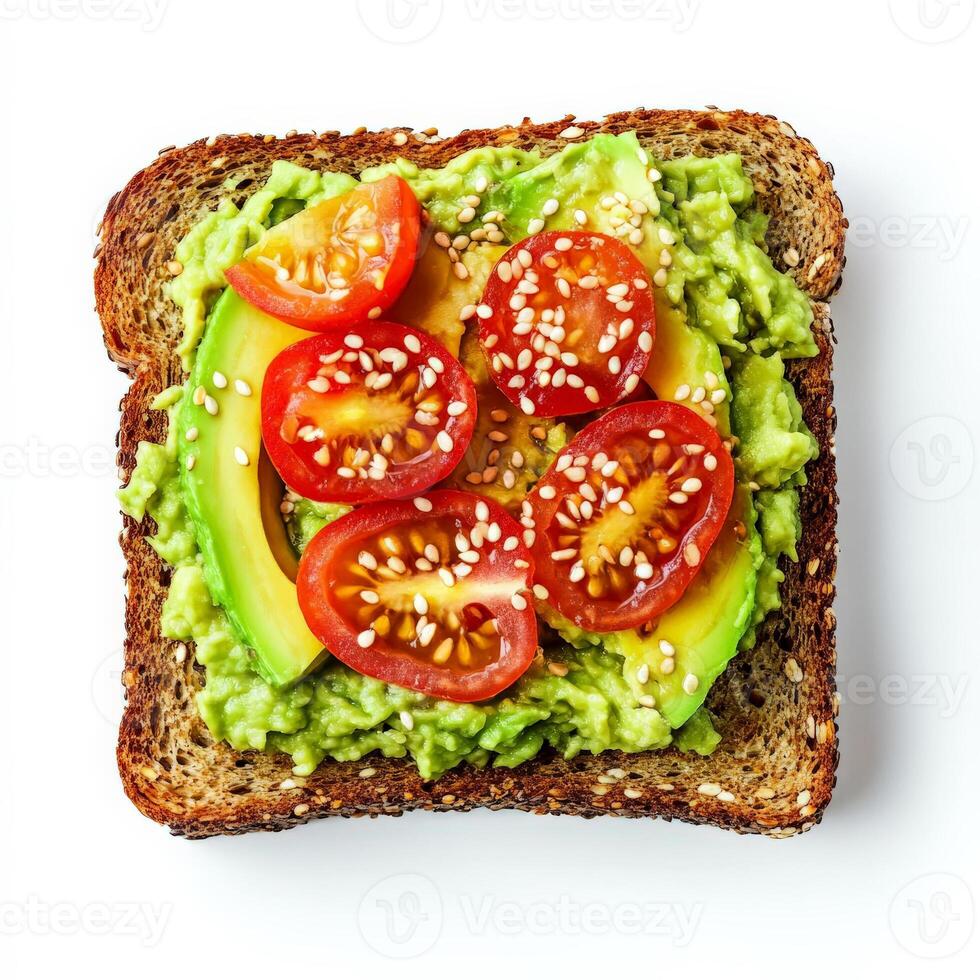 A fresh avocado toast on whole-grain bread, topped with mashed avocado, cherry tomato slices, a sprinkle of sesame seeds, and a drizzle of olive oil. The creamy texture contrasts with the crisp bread, making it a perfect healthy snack. Isolated on clean w photo