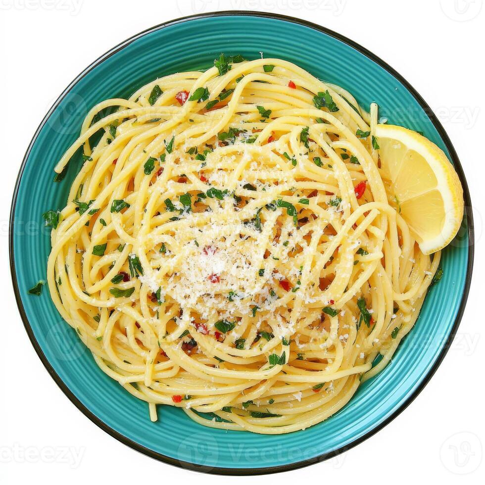 A vibrant plate of spaghetti aglio e olio, with spaghetti tossed in garlic-infused olive oil, red pepper flakes, and fresh parsley, a simple yet flavorful dish, garnished with grated parmesan cheese and a lemon wedge, isolated on clean white background. photo