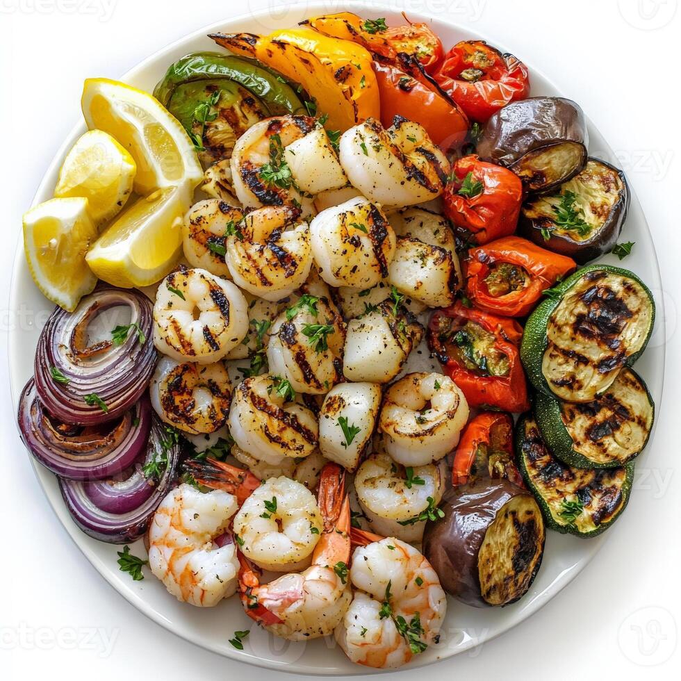 A vibrant platter of mixed grilled seafood and vegetables, featuring shrimp, calamari, scallops, fish, zucchini, eggplant, bell peppers, and red onions, marinated in olive oil, lemon juice, garlic, and herbs, grilled until tender and slightly charred, ser photo