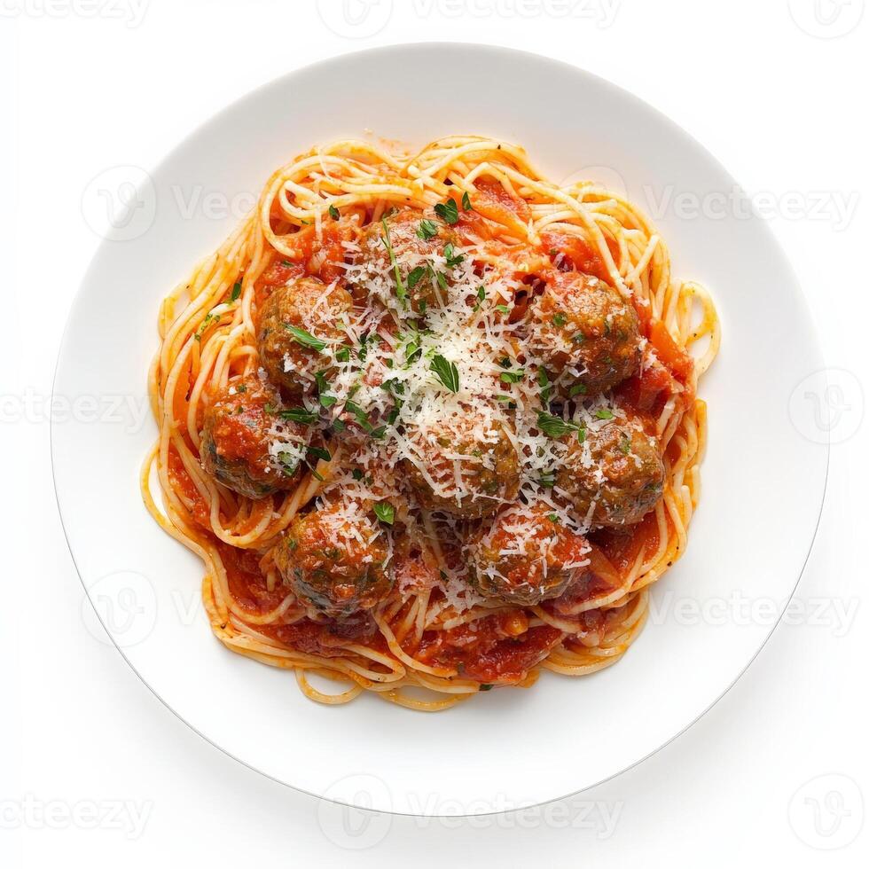 Spaghetti with meatballs and tomato sauce on white background photo