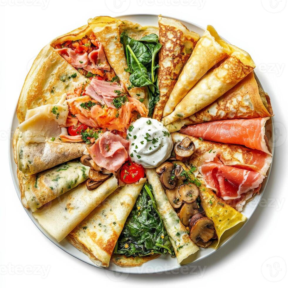 A plate of crepes with various types of food photo