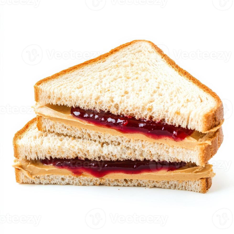 A peanut butter and jelly sandwich is shown on a white background photo