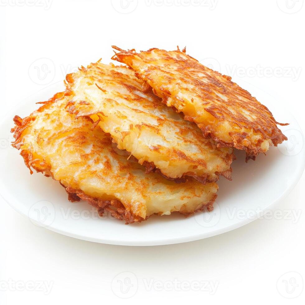 A plate of potato pancakes on a white background photo