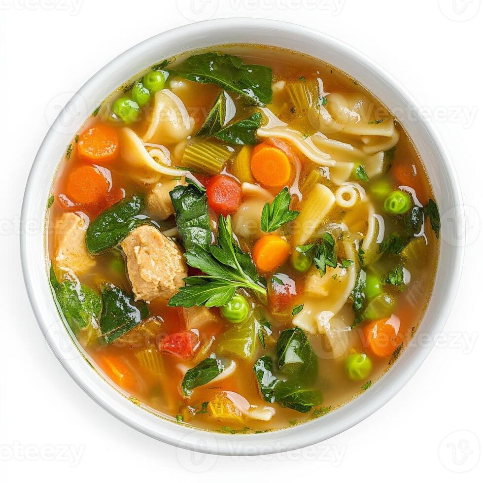 A bowl of soup with vegetables and meat in it photo