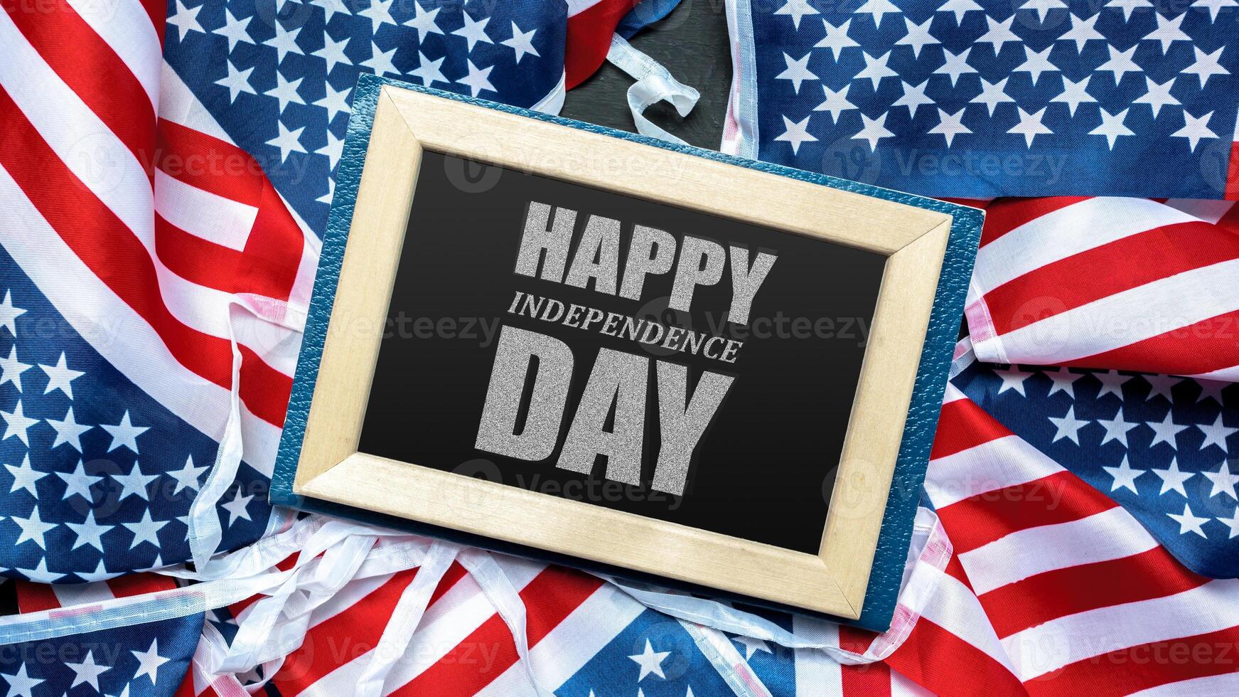 Festive celebration of Independence Day with American flags and a cheerful greeting displayed on a stylish frame photo